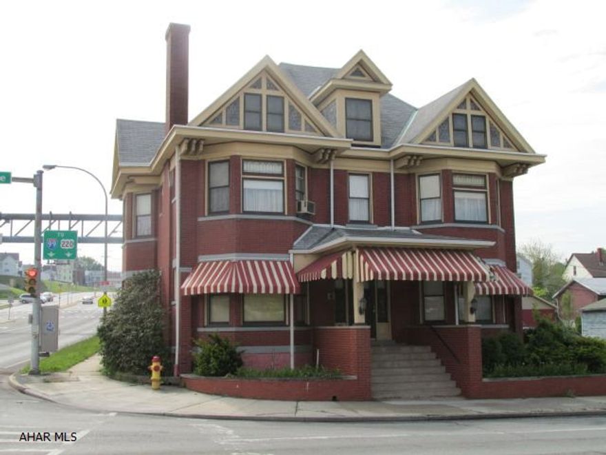 Unlimited Potential - (seller owns almost the whole block, all except of 1711 6th ave.)Magnificent house - previously used as a funeral home, 3 fininshed floors, beautiful woodwork, 2nd floor was living quarters, 3-4 BR, LR, dining room, kitchen, full bath, sun porch, plus 2 BR apartment over 3 car garage - LR, DR, kitchen, laundry, sep. entrance and connects to sun porch - basement finished area - utility, built in storage - laundry hook-ups - would make a terrific law office location. *See documents for breakdown of taxes. Additional Tax #'s 135,136,137,139,140,141,143. Motivated Seller - Bring Offers!!  Super business location!