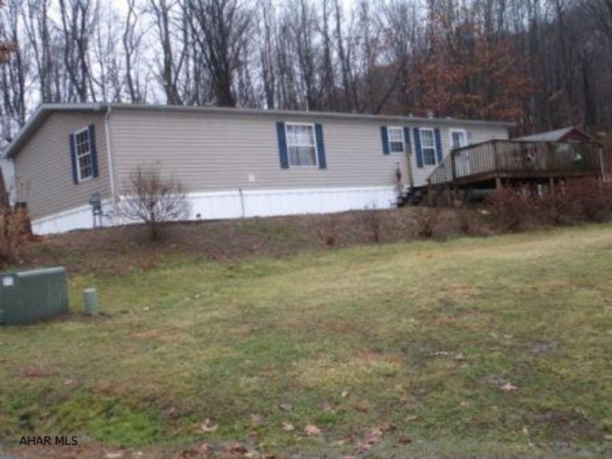 Large and Roomy one floor living! 3 BR and 2 Full Baths with Central Air and a gas fireplace. Nice Deck and Woods in the back. Possible owner financing with a large down payment.