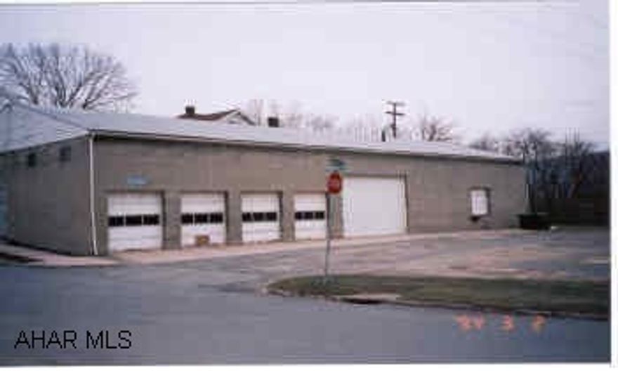 Building, concrete block is 48x119 Inside truck Depot warehouse and office area, approx 6000 sq ft. 5,400 on 1st level, 600 sq ft lo ft. 6 pull inside truck bays with inside dock unloading, 1 outside tractor-trailer dock. 2 private offices. 2 handicap accessible bathrooms. Ability to wash trucks inside. 1 double bay with auto door 25' long 13:6' height and 20' wide. DEED RESTRICTIONS WILL APPLY!