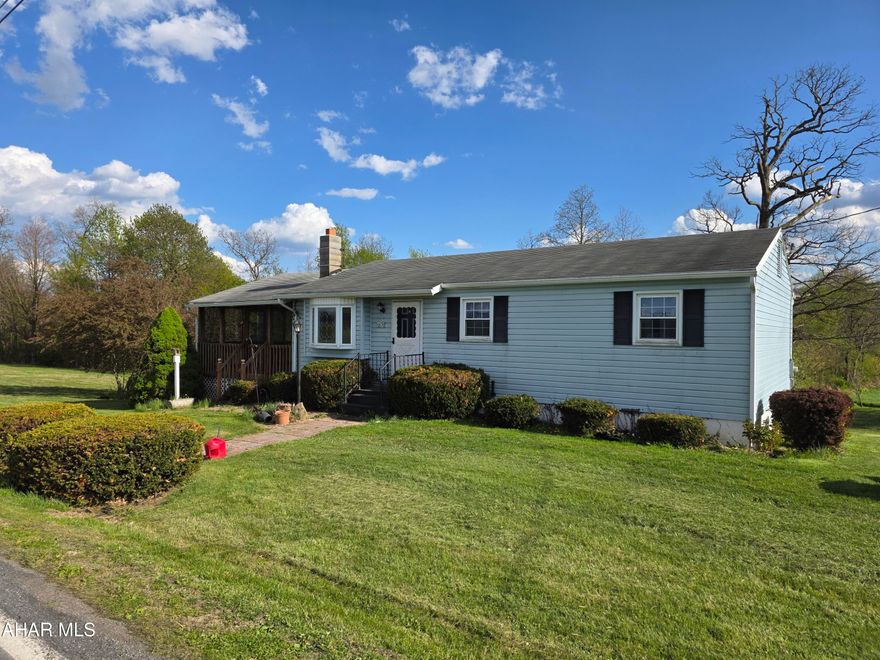 3 bedroom rancher with 1 car garage on 1.13 acres in Sinking Valley. Modern kitchen and bathroom. Large covered deck. Lots of potential.