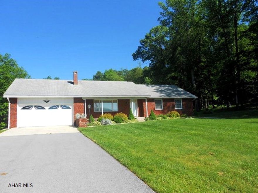 Welcome to one level living. Beautiful views on 3.26 acres. Backyard pavilion with built-in barbeque. Outside shed and lovely landscaping. This home has been well kept with new windows and all new stainless kitchen appliances. Paved driveway leads to a 22'x22' attached garage, walk-up attic space, and full unfinished basement. This home is just waiting for you!