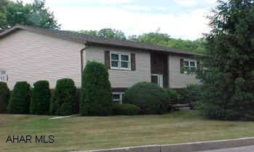 Immaculate bi-level on great corner lot near the park. New vinyl siding, windows, storm doors and French doors, May 05. New carpeting, upgraded bathroom, furnace 2001. Terrific home! Updated FEMA map by underwriter for closing - flood insurance not required.