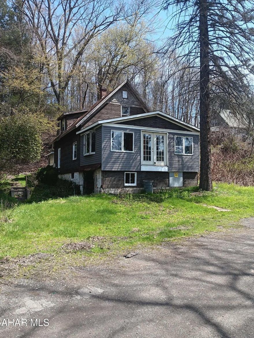 Check out this fixer-upper in East Taylor Township featuring 2 bedrooms and 2 baths. This home offers a very open floor plan and sits on over a quarter-acre lot, providing plenty of space both inside and out. While it does need some improvements, it presents a great opportunity to bring your vision to life and create the home you've been looking for.
