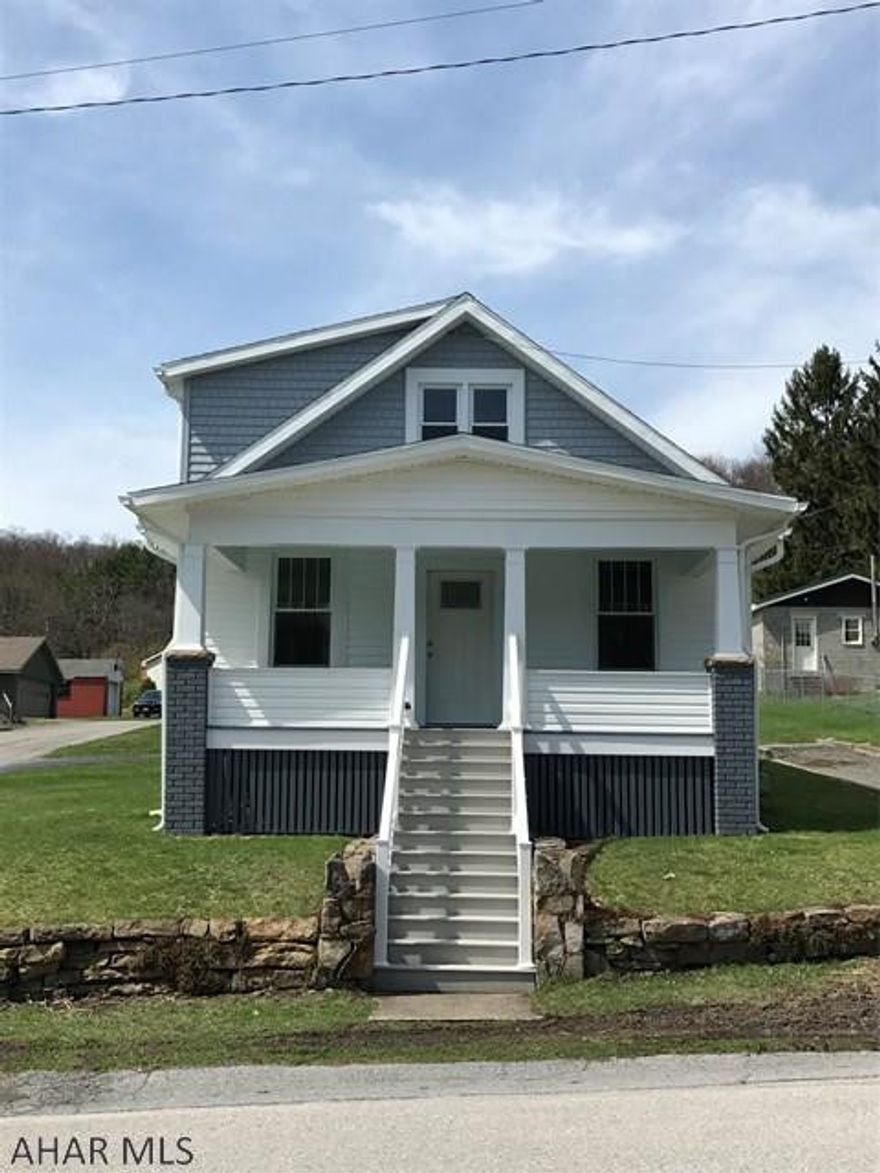 Location, Location, Location!!!! BEAUTIFUL turn key house. NEW roof, NEW spouting, NEW windows, NEW doors, NEW front steps and railing. NEW Bathrooms! Did I mention BEAUTIFUL hardwood flooring through out. Very large yard, off street parking with a attached garage. Great neighborhood!!!! 3 bedroom with a captured room currently used for a bedroom with a closet.