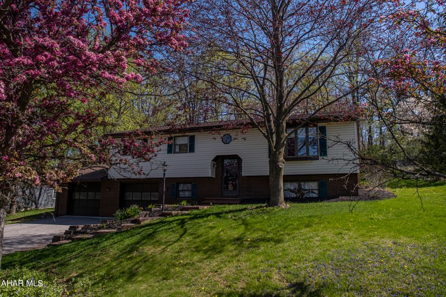 Welcome to this beautiful home located in the sought-after Rolling Hills development in Hollidaysburg, PA! This stunning property sits on a .27 acre lot and boasts 3 spacious bedrooms, each providing ample space and comfort for rest and relaxation.

The open concept design of this home is perfect for entertaining guests and creating lifelong memories.

One of the many highlights of this property is the spacious two-car attached garage, complete with additional space for storage and workspace. This garage is perfect for storing vehicles, tools, and any other equipment you may need.

The rolling hills of this development provide a serene and peaceful environment, perfect for unwinding after a long day.

This home is perfect for anyone seeking a spacious and comfortable living space in a peaceful and serene location. Don't miss out on this incredible opportunity - schedule a viewing today!