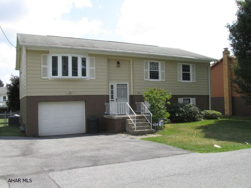 Terrific split entry in quiet neighborhood.  New furnace/central air, windows, sliding door, vinyl.  Fenced yard 1 car integral garage. Nice sized rooms - Master suite.  Great for move up, close to  elementary school, convenient to shopping, restaurants and churches.