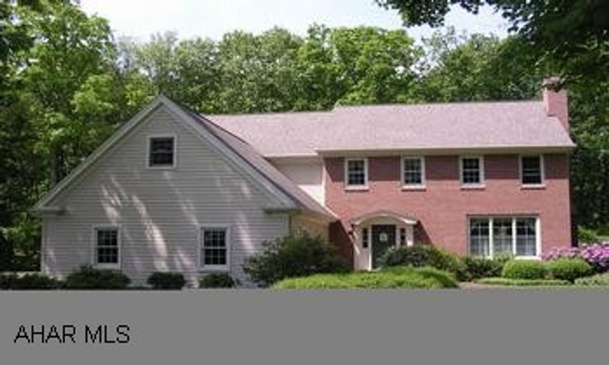 A Country Palace!  The ultimate custom built home!  Beautiful wooded setting with 3 acres, 4 BRs, two fireplaces, finished basement with 2nd kitchen, hand-crafted cherry molding and built-ins, cherry kitchen, steam sauna and dry sauna, and central vac. A Country Palace!  The ultimate custom built home!  Beautiful wooded setting with 3 acres, 4 BRs, two fireplaces, finished basement with 2nd kitchen, hand-crafted cherry molding and built-ins, cherry kitchen, steam sauna and dry sauna, and central vac.  Security System and much, much more!  More details and virtual tour at www.CAROLGARDINER.com