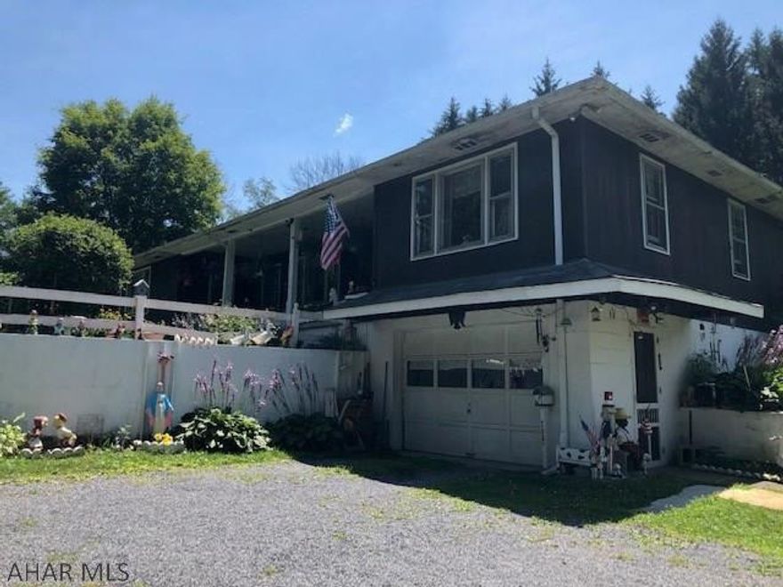 Very solid built 4 bedroom 1 bath in Hollidaysburg schools. Large storage shed with carports, new oil furnace, new 200 amp service, new water tank and pump. Very secluded on 5 acres. Needs some TLC to make it a dream home.
