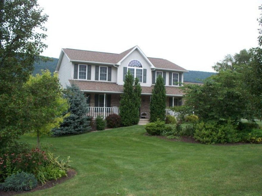Great view of mountains & golf course. Very nicely landscaped. Peaceful & quiet area close to Canoe Creek State Park & State Game Lands. Newly painted interior. Clean home. Lower level family room with great view, bar, surround sound, etc. Open front porch, rear deck & patio. Walk to Canoe Creek.