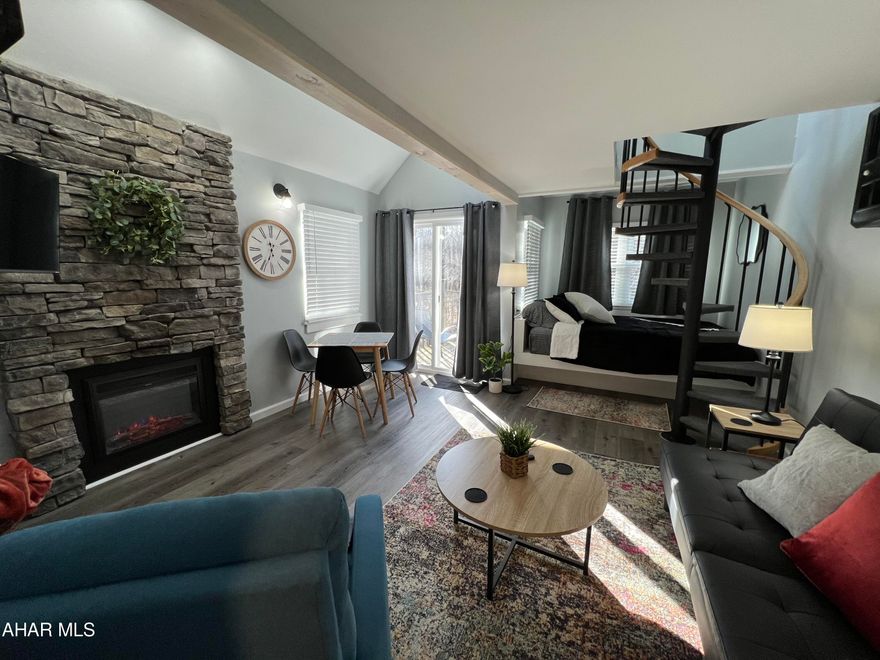 Rustic loft in the Allegheny Mountains at Blue Knob All Seasons Resort has everything you need. Remodeled and fully furnished. New wood kitchen cabinets countertops, windows, sliding door, flooring, fireplace, stainless appliances and so much more. Breathtaking stone fireplace and Wood accents make this condo a wonderful place to be anytime of the year. Walking distance to indoor pool/hot tub, outdoor pool and The Club House Bar & Grille. Blue Knob is the 2nd highest mountain and highest skiable mountain in Pennsylvania! In addition to an array of winter activities, Blue Knob also has a full-service all seasons Conference Center for weddings and events, they also offer golf, swimming and multitude of trails for hiking, running, and mountain biking. Visit https://blueknob.com/activities-events/ to see all the fun events that are happening at Blue Knob. $290.00/ Mo HOA fee includes: pools, hot tub and gym area, tennis and pickle ball courts, building, property maintenance & garbage. *Additional fees apply for conference center, Golf and Skiing