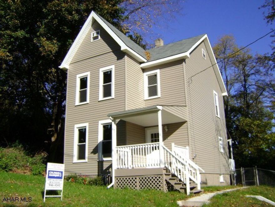 Attractive home, like new, on large 97x100 irregular lot.  Baker Elementary School.  Enjoy 2 covered porches, large fenced yard and off street parking.  Kitchen has granite counters and ceramic tile floors.  Attic could be 4th bedroom.  1st floor laundry.  Wooded lot also available.  house across the street to be remodeled. New furnace is being installed.