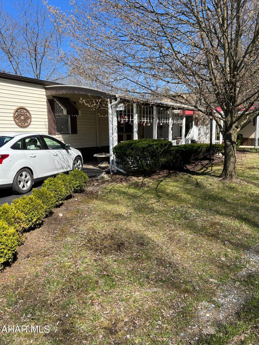 Sweet set up in a 55+ mobile park. Private setting, enclosed patio area with swing and tables. Private yard. Home includes washer, dryer, freezer, yard equipment. Don't miss out on this one.