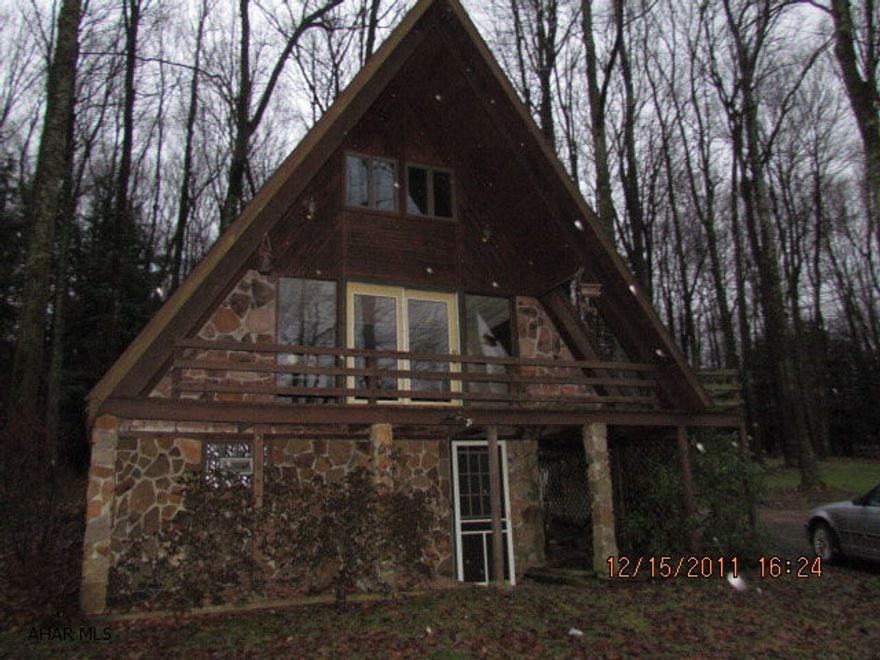 Glendale Area- gated community with HOA, A-frame with stone accent, huge deck with lovely view, private deck off master bedroom, lots of windows, open living area, walk-out basement. A little tlc would make this a fantastic home or getaway! Homeowners Association fee is billed first 3 qtrs of yeat at $141.83  Total $425.49. Owner occupants get a 2 year Home Protect Limited Home Warranty!