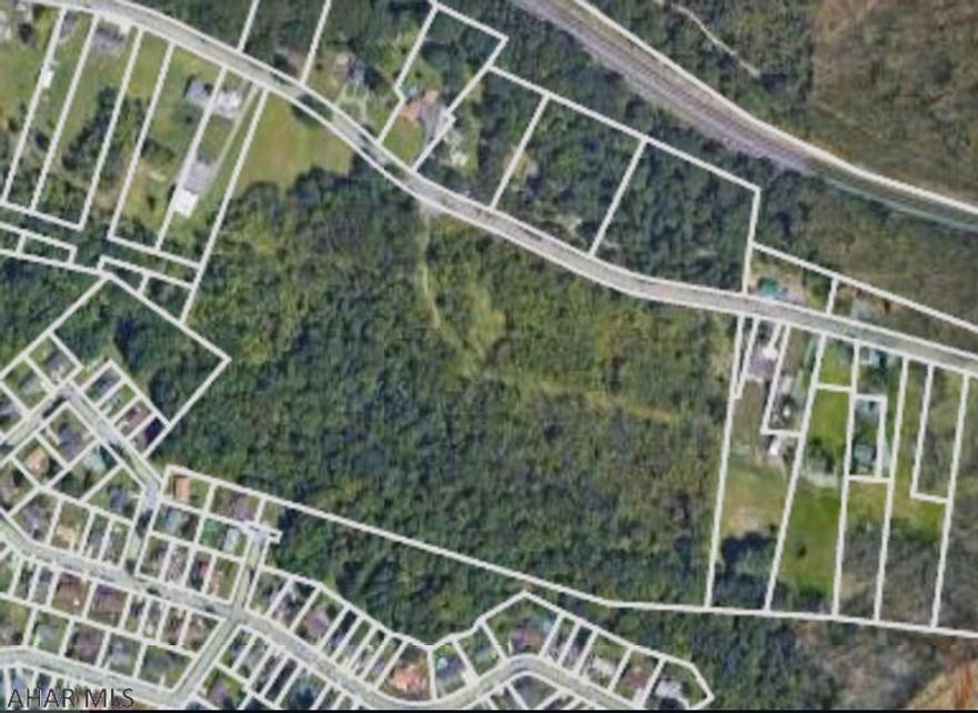 Over 24 Acres of real estate.   About half of this property can be developed and about half is in what is considered wet lands. You can still use the wetlands for different uses especially as a privacy buffer is a little is put with each parcel subdivide.     All utilities should be accessible to property.   Low logan twp tax rate. Grab this opportunity before someone else does!