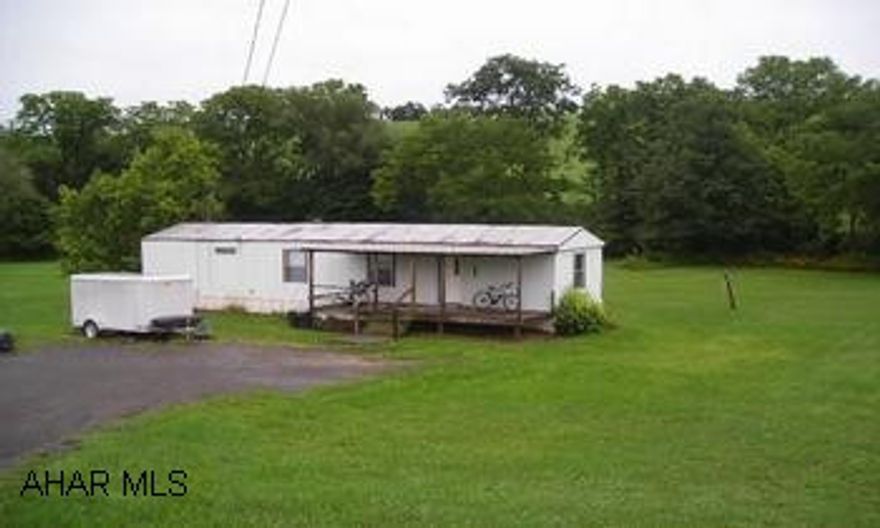 Nice setting and views - comfortable trailer. Nice setting and views, convenient location, comfortable trailer;1991 14'x70' Champion  (Agents:  24 hour notice required)