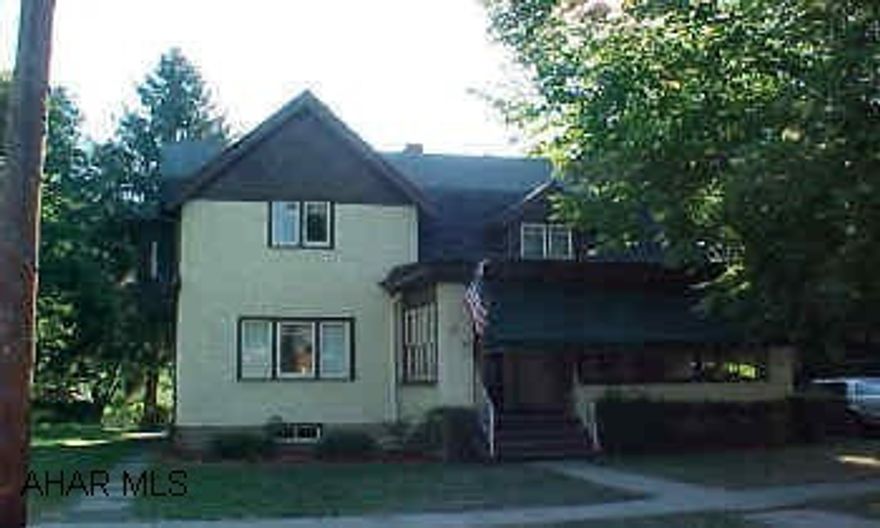 Lovely Arts & Crafts era home. Built in bookcases & brick fireplace in living room. Formal dining room with stained glass window. Lovely open foyer. Large eat-in kichen, nice lot with detached garage. Call Dianne or John 329-1856