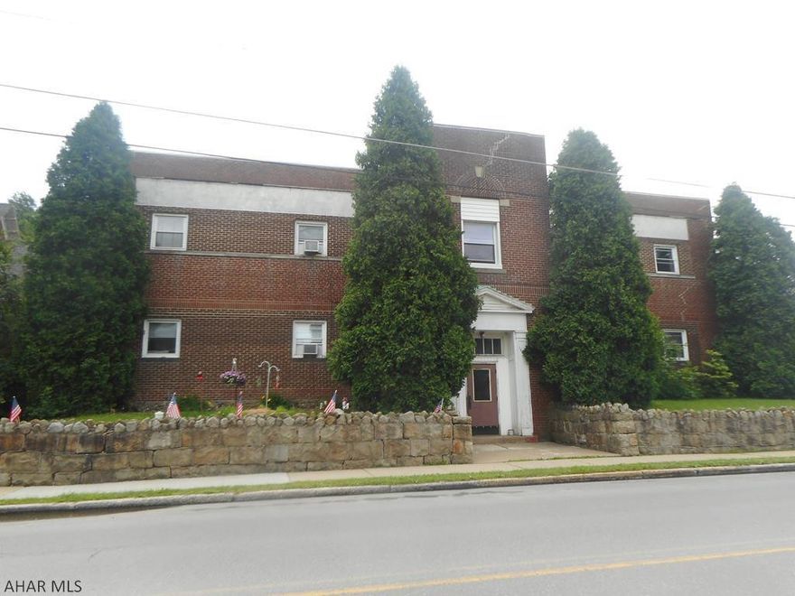 School converted to 11 apartments. Units have been maintained and feature drywall walls and updated kitchens. Most units are 2 bedrooms. One unit owner pays water/sewer. Great income producer. Rubber roof and brick exterior. Full basement.