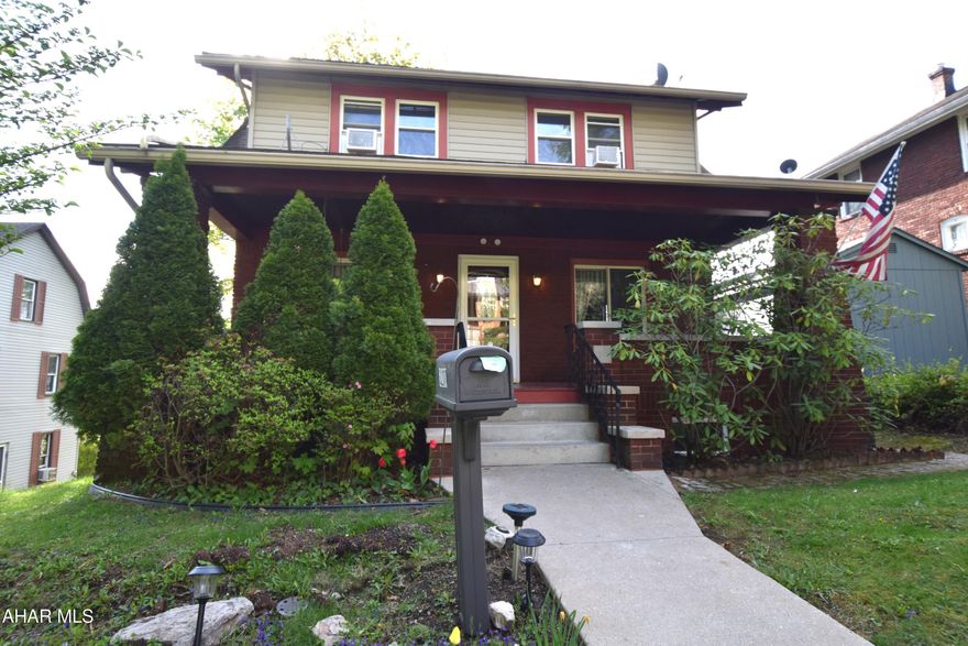 ***  MOTIVATED SELLER*** Charming two story with beautiful hardwood floors, French doors, and window seat in dining room.   Eat in kitchen with breakfast bar.  First floor laundry.  Basement is finished and set up for quest quarters with kitchenette and full bath.   All mechanical systems are in good condition, home has replacement windows, and there is a newer composite deck in the rear for outside enjoyment.   Plus the large front porch with porch swing!!