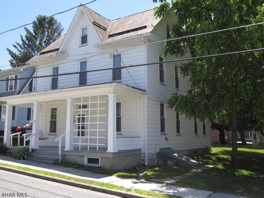 A sound 2 1/2 story on a flat lot, in a nice neighborhood.  It has 4 bedrooms, one on the main level and 3 on the 2nd level  along with a nice size bonus room.  One full bath is on main level and the other full bath is on the 2nd level.  The nice size laundry is also on the main level.  The walk-up attic could be finished or used for storage.  Other goodies include thermo pane windows, 200 amp breaker box and large covered front porch w/swing.  Years ago house was a duplex and that could be revisited to suit as a rental.  Property being sold as is, seller wishes to make no repairs.