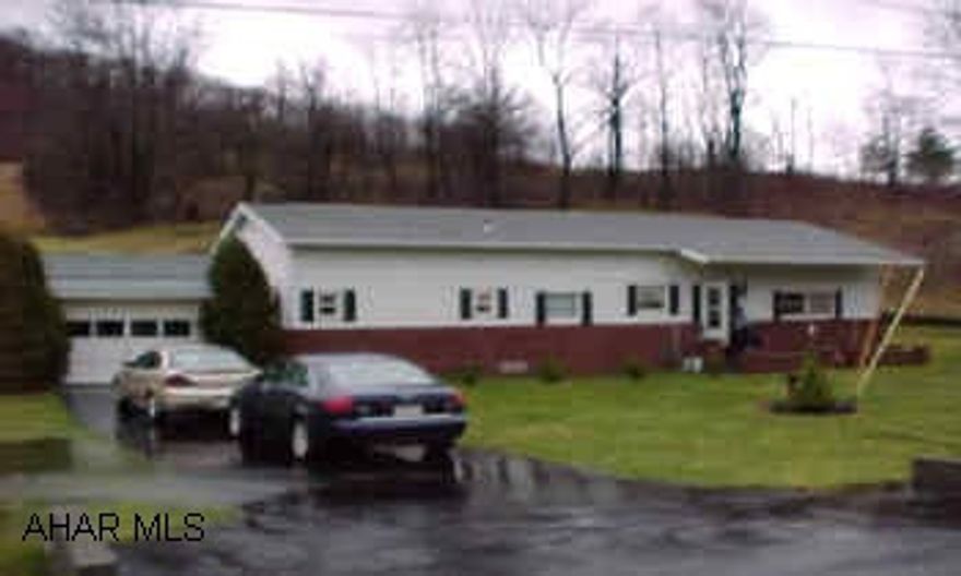 1 story home. A small portion of the original mobile home still exists. Much of the home is built around that. Neat but novel room layout. 3 levels and a basement. Third bedroom in basement. Home is in good condition. Kitchen was remodeled one year ago.