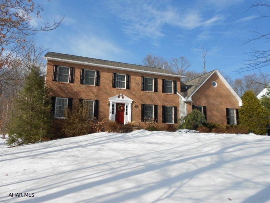 This 2 story home offers an updated kitchen with stainless steel appliances, granite counter tops. High ceilings, large bedrooms. Family room off the kitchen with fireplace. Finished basement. Screened in porch with wrap around deck. Heated in ground pool 16x32. Property in wonderful condition.