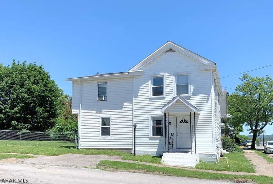 Hollidaysburg borough. Large 4-5 bedroom 1.5 bath home that offers a large kitchen, living room, dining room  w/ laminate floor, and family room. Full bath that has been recently updated with new sink and flooring. 5th bedroom currently used as a large dressing room/closet. Newer carpet, nice fenced in yard with a shed and off street parking. Covered patio and covered porch.