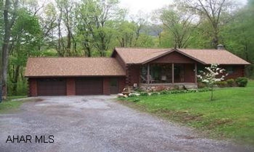 Lovely and Spacious Log Home with 4 Bedrooms, 2 Baths on 1.4 acres.  Finished basement has summer kitchen, family room, extra bed.  Quiet wooded setting.