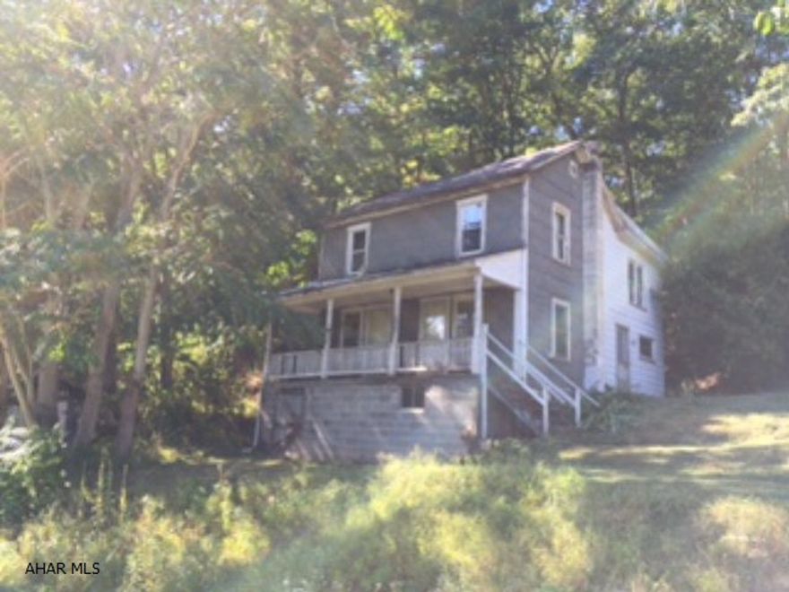 3 bedroom, 1 bath farmhouse. Sits on almost 3.5 acres. Private. Needs TLC.