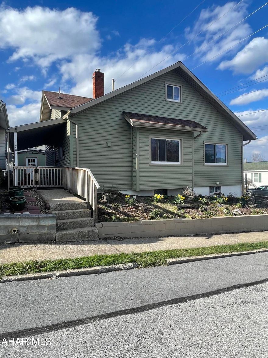 This well maintained, 3 bedroom, 1 bath home, sits on a nice corner lot with a fenced in yard. There is nothing to do but move in.  This home has central air, a covered deck, newer roof, windows and updated mechanics.  The second floor bedroom is accessed through a main floor bedroom.