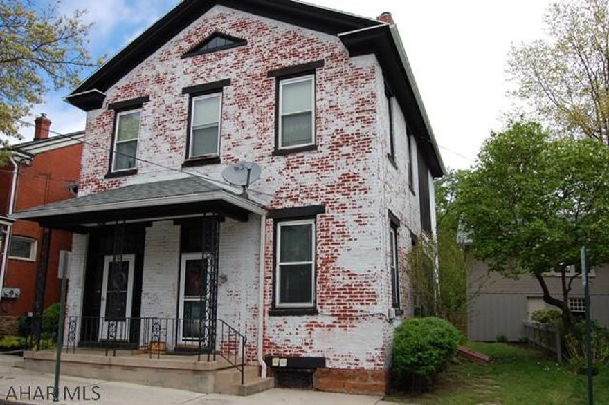 Here's your chance to own a beautiful part of history in Historic Hollidaysburg.  First floor apartment features an oversized living room and nice updated kitchen.  Large Bedroom with walkout sunporch for those relaxing nights.  Second floor apartment has 2 bedrooms, large living room, kitchen and dining room.  Sunporch as well off the living room and can be accessed from 2nd bedroom.  Call today to schedule your private appointment!