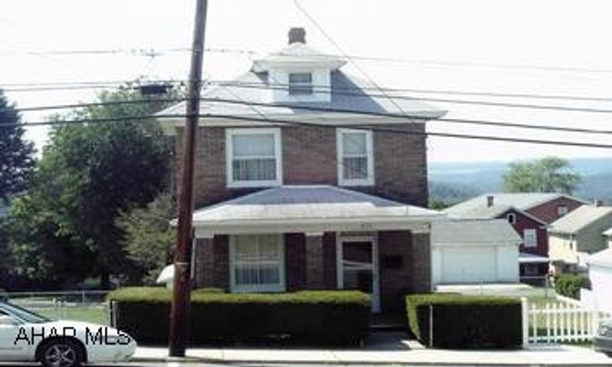 Solid 2 story brick home sitting on 3 lots with a 2 car detached garage. An unusual find in Portage- 3 fenced level lots, located close to town- Great starter or retirement home, includes chair lift for stairs(seller will remove if buyer does not want it)