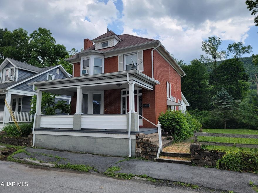 Updated 2 story, 3 bedroom brick home on corner lot. 2 full, updated baths. First floor bedroom, bath and laundry. Decorative brick fireplace in dining area.  New floor coverings. Rear deck.