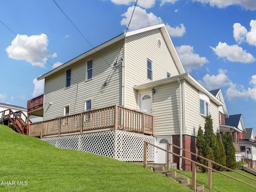Welcome to 2815 Bigler Avenue in Northern Cambria! This well-maintained home offers plenty of space, functionality, and charm throughout. The main floor features a spacious kitchen, dining area, updated full bathroom, large living room, and an additional bonus room perfect for a home office, playroom, or extra living space. The second floor offers 3 nicely sized bedrooms, including one with sliding glass doors leading to the rear deck. The basement is unfinished but provides excellent storage space and houses the laundry and mechanicals. Outside, you will find a spacious yard, off-street parking, side porch, concrete patio, and a large rear deck ideal for relaxing or entertaining. The detached 1-car garage includes power, making it perfect for a workshop or hobby space. Call today to schedule your private tour!