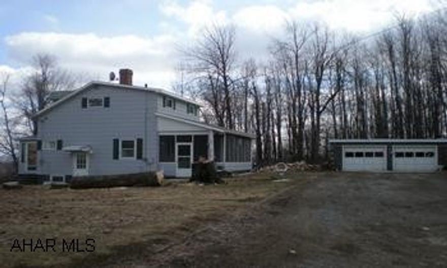 Exceptional home. 2-3 BR, 2-story with detached garage.