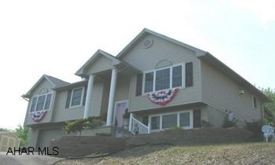LESS THAN 2 YEAR OLD CONTEMPORARY BI-LEVEL IN ANTIS TOWNSHIP. KITCHEN WITH OAK CABINETS, HARDWOOD FLOORS, FRENCH DOORS OUT TO A DECK WITH AWNING. BEAUTIFULLY DECORATED. PLEASE TAKE OFF SHOES. LESS THAN 2 YEAR OLD CONTEMPORARY BI-LEVEL IN ANTIS TOWNSHIP. KITCHEN WITH OAK CABINETS, HARDWOOD FLOORS, FRENCH DOORS OUT TO A DECK WITH AWNING. BEAUTIFULLY DECORATED.