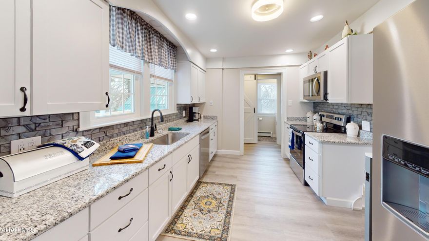 This is it - look no further! Completely renovated 3 bedroom, 1.5 bath home in Ebensburg with detached garage on a large level lot. New roof, new windows, new paint, new flooring, new kitchen, new bathrooms, new furnace, new plumbing, new electrical and new deck. Downstairs you will find a living room with wood burning fireplace, formal dining room, galley kitchen, half bath and bonus room that could be a den, office, or playroom. Upstairs you find 3 bedrooms with a full bath. The spotless basement provides ample storage. Check out our Matterport 3D tour and schedule your showing today!