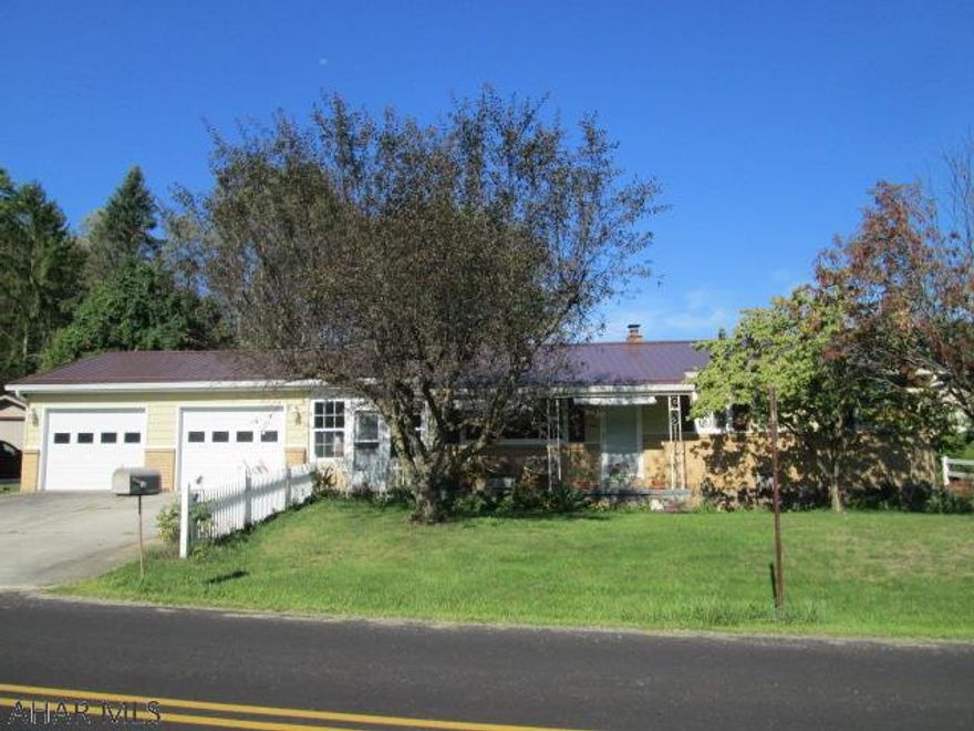 One story living in Logan Twsp. This home has recent upgrades that include new roof, new gutters, new doors at front and breezeway and new flooring throughout. The sale will include the oak kitchenette, all appliances and any remaining furniture. Just unpack your clothes!