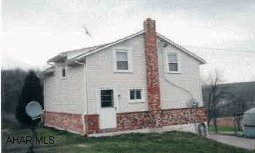 Great Starter home, 2BR/1 1/2 BA, 2-story home on 2.36 acres. Newer tilt-in windows, peaceful country setting, large yard.