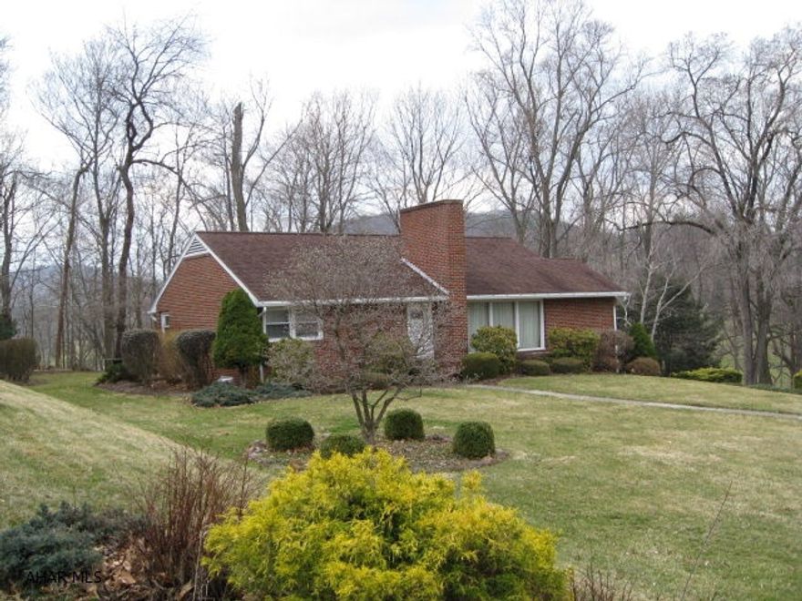 Solid brick house in Meadowbrook Terrace. Quiet street, first-owner pride, near schools and shops. Large living room with fireplace and hardwood floor, family room with fireplace, 2BR/1 full 1 half bath. Partially finished basement, newer windows, new cooktop and double oven. Patio, mature plantings, city utilities. Priced to sell!!