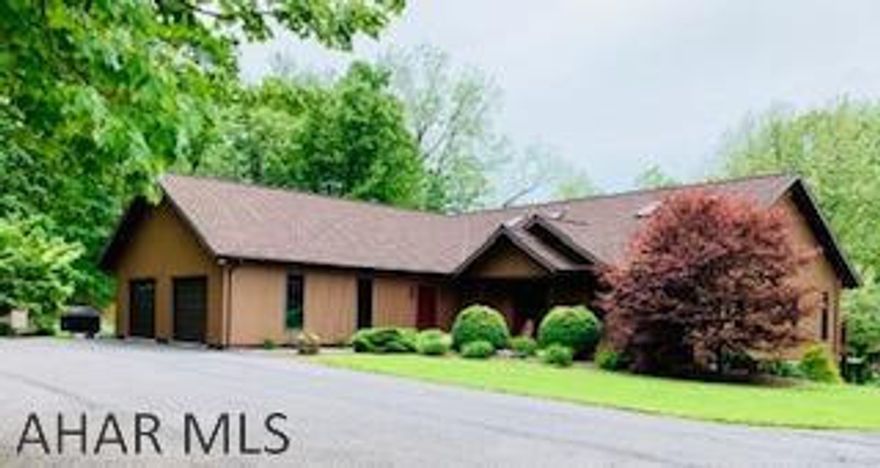 Immaculate custom built home on 2.9 acres with privacy and views! Paved driveway and a separate 30x50 garage and office with propane heat and 1/2 bath. Replaced with Alcoa American walnut vinyl siding, 7 new exterior doors, 2 radon systems, garage doors-metal, 2013 new custom kitchen was installed w/granite counter tops, new appliances and lg.island.  2015 new furnace installed, AC unit, and new roof.2016 wood blinds and new outdoor carpet. 2017 new front deck with new railing.  Many updates!