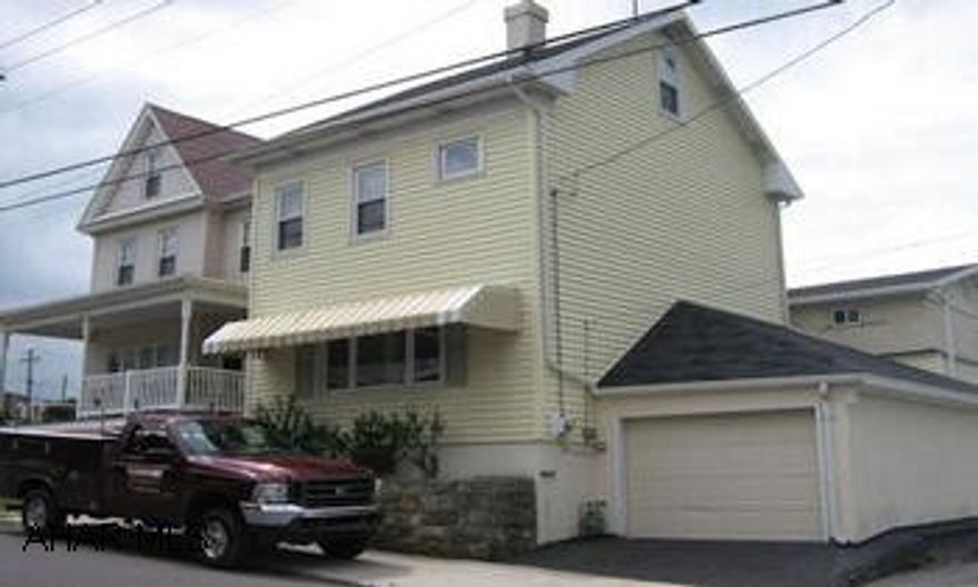 Extremely well maintained 2 bedroom home with finished attic and  separate efficiency apartment above second one car garage.  Nice hardwood floors and woodwork.  Great investment property or good for guest quarters or mother-in-law suite. Extremely well maintained 2 bedroom home with finished attic and separate efficiency apartment above second one car garage.  Nice hardwood floors and woodwork.  Great investment property or good for guest quarters or