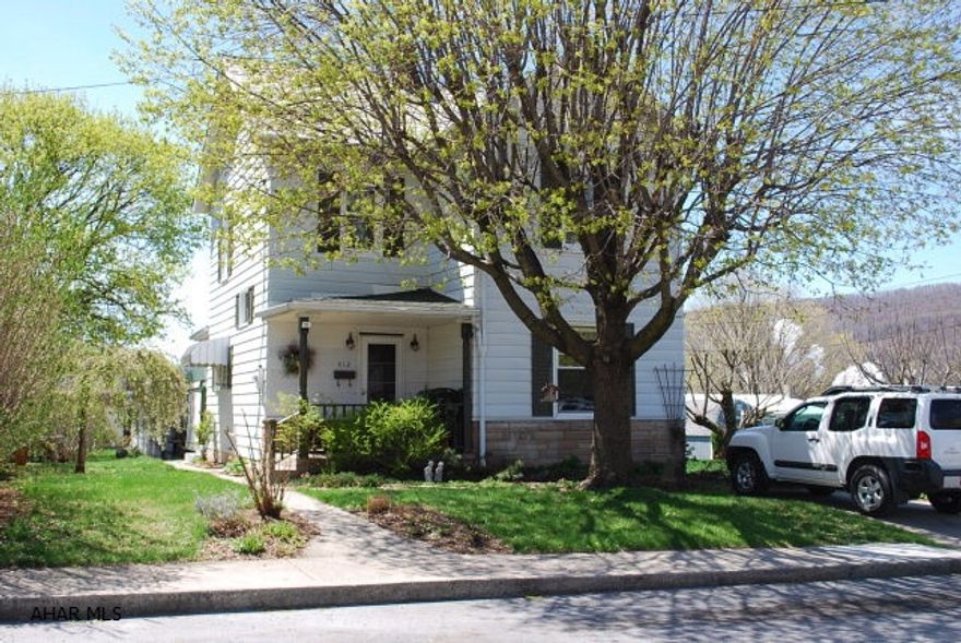 The home was originally a 3 Bedroom that has been converted into a 2 bedroom. It can be easily turned back into a 3 bedroom home. The home has hardwood floors through out the main floor. The second floor has a mixture of hardwood and laminate flooring in the hall and bedrooms.