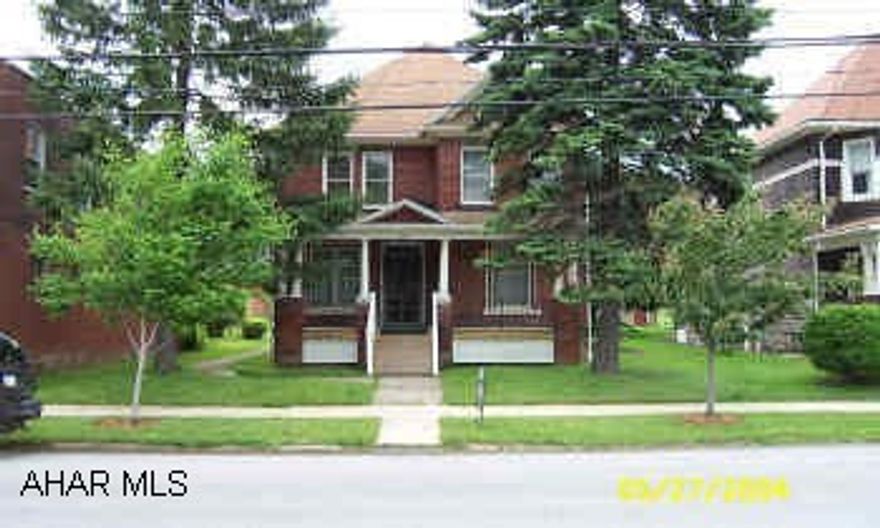 2 porches, high ceilings and old woodwork