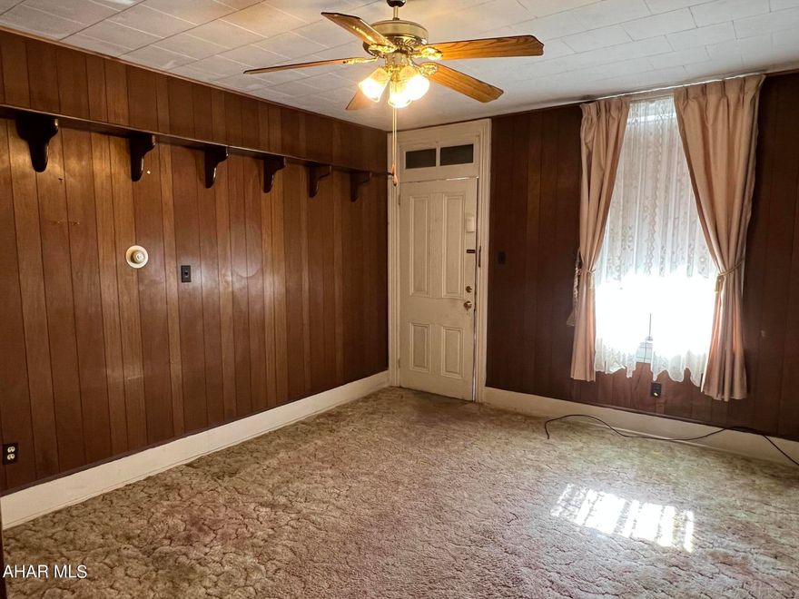 Location! Location! Location! This property is in the well sought-after Hollidaysburg borough, one block from Courthouse, and all within proximity to everything the Downtown area has to offer.  This home was used as a family home. The one half of the home features a 2 BR and 1 Bath and a 1 BR 1 Bath on the other side. There are separate areas in the basement for Storage, Laundry  and a walkout basement.  The seller's estimate the roof installed approximately in 2018, A/C 2007, and a refrigerator purchased in 2019. Water and septic on one bill, and 110 Amp individually serviced to each unit. There is plenty of POTENTIAL for this property: Single Family Home, Duplex, live on one side and rent the other side to a family member to help with your mortgage payment. In addition, This home has an alley behind the house for off street parking and a nice flat lot! What are you waiting for? Give us a call to schedule an appointment!