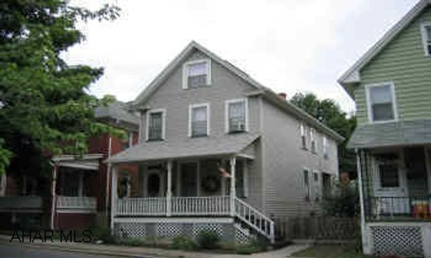 2 1/2 Story Vinyl siding, 3 or 4 Bedrooms, computer room, finished 3rd floor