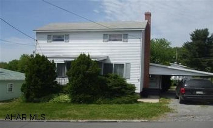 Aluminum sided 2 story with 1 car detached garage with workshop area, carport, back deck, front covered porch. Square footage is per tax card.  Basement is original (old) foundation.  Home rebuilt around 1950 after fire destroyed original structure.  Lot is irregular.  Per tax map - fr.50 x rt122 x bk55 x lt102