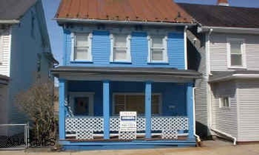 2.5 STORY, 4 BEDROOMS. UPDATED WIRING, NEWER HW FURNACE, OFF STREET PARKING.