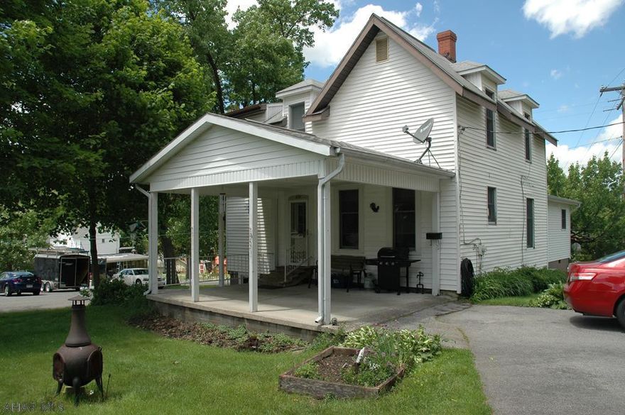Corner lot in Lakemont, 3 Bdrms, 2 Baths, eat in Kitchen (granite top built in table), Dining Room with laminate floor and built ins., addition added for living rm. or 1st floor bedroom, enclosed porch used as office/additional storage closet, carport.  2nd floor has 14'2x7'6 storage room, 1st and 2nd floor has updated bathrooms.