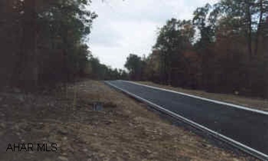 Lot 25-.359 Ac  Private wooded building lots-Choose your owncontractor-Additional cost at closing as follows:Sewer Permit $1400.00 Homeowner Association Escrow $400.00