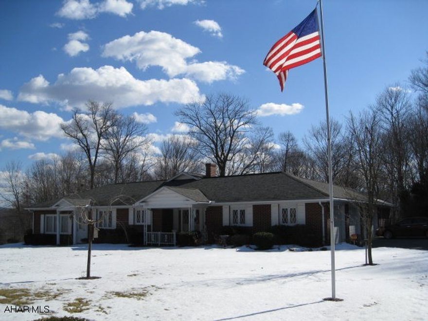 One owner, spacious and very well maintained brick ranch with 3500+ sq ft in an area with good pride of ownership! Close to town and mountain views, mature landscaping. Huge 30'x25' addition with gas fireplace w/heatalator. New geothermal system w/2 heat pumps- 2010 electric bill +#2693. Two septics, paved drive. Full bath, rec room w/wood burning fireplace in basement, central air, vinyl replacement windows, 3 car attached garage, security system.